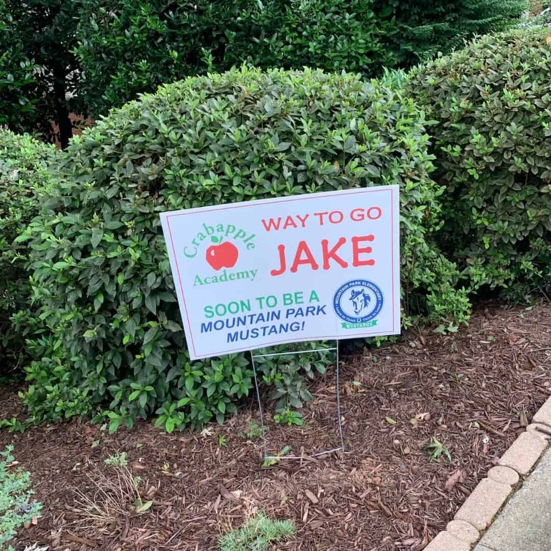 Georgia school graduation yard sign in front yard